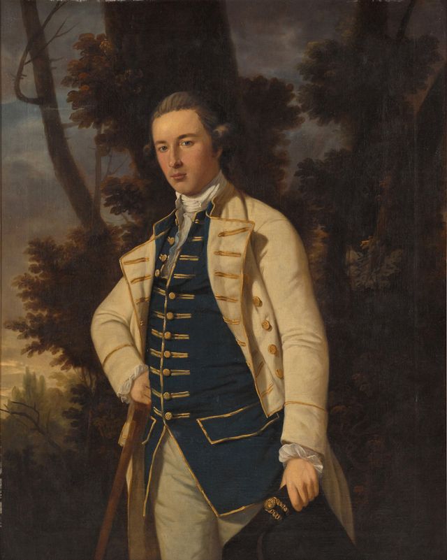 Portrait Of A Man, Three-quarter-length, Wearing A Beige Jacket With A Blue Waistcoat And A White Neckcloth, In A Wooded Landscape