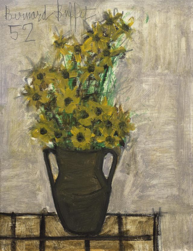 Fleurs jaunes dans une cruche