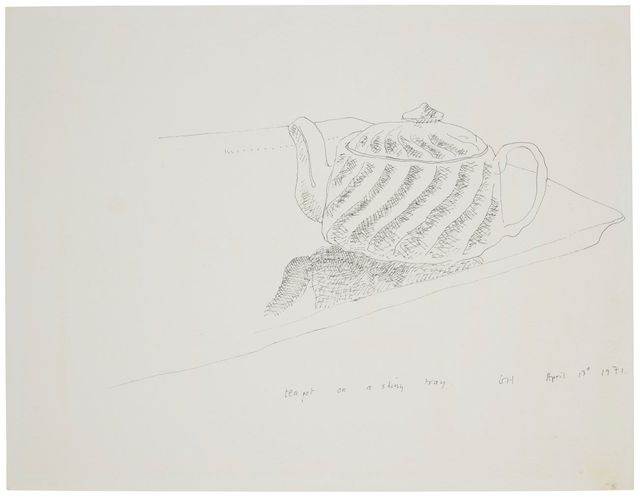 teapot on a shiny tray