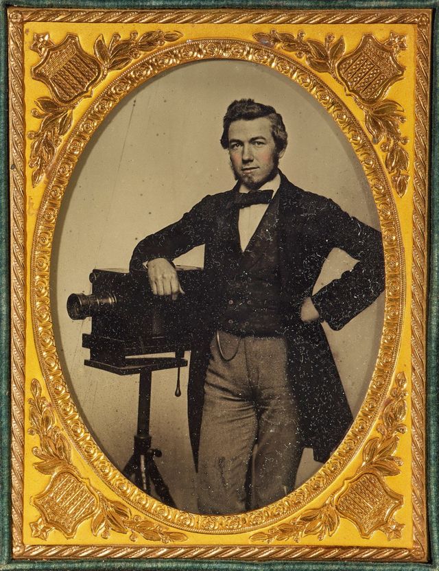 Photographer with Robert’s-Style Half-Plate Daguerreotype Camera, c. 1858