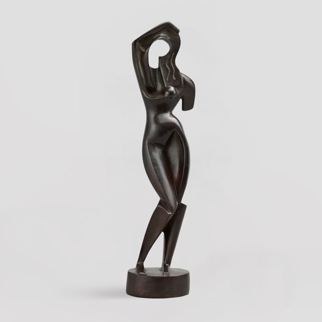 Woman Combing Her Hair