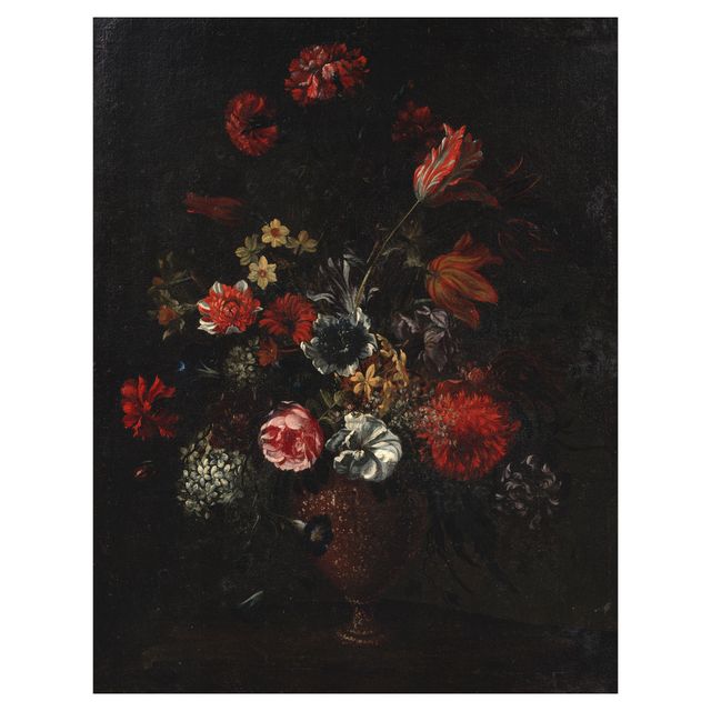 A still life of roses, tulips, narcissi and other flowers in a bronze urn on a stone ledge