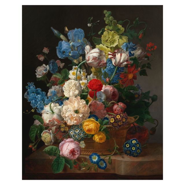 A still life of roses, tulips, irises and other flowers in a basket on a stone ledge