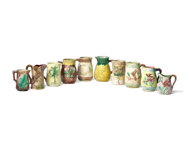 A Collection of Ten Small Majolica Pitchers