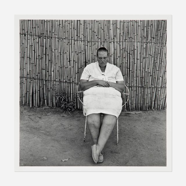 Woman Sitting in Front of Bamboo Fence, Gauteng, 1996